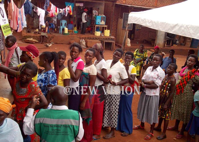   esidents of usana anding site in uikwe district lining up the medical check up