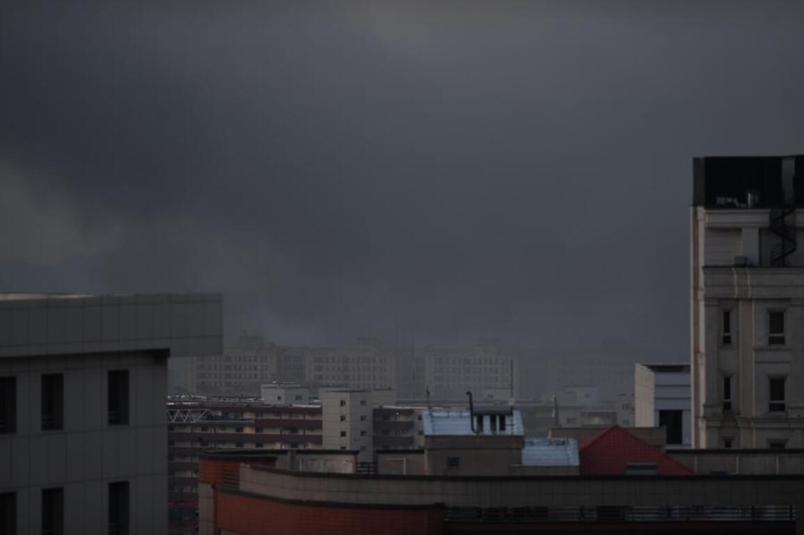 Mideast in Pictures: Smoke rises over Tehran following strikes at dawn