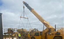 The spinner being placed on the cured foundations at Kat Gap.