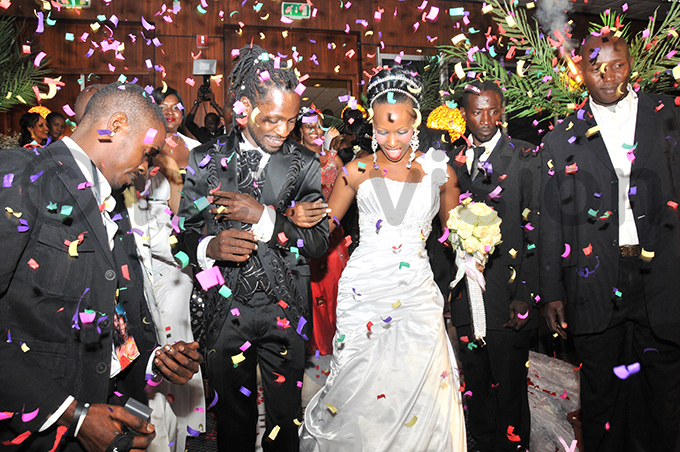 obi and arbie entering the reception venue in ugust 2011