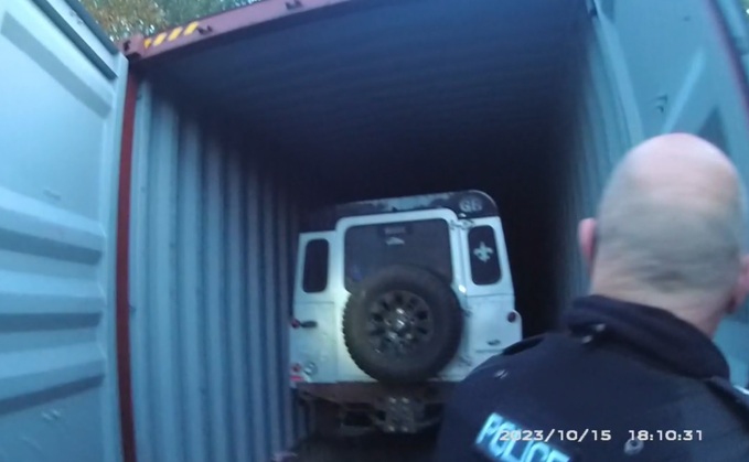 Officers released an image from the raid with one of the containers storing a suspected stolen Land Rover Defender and a Land Rover Sport HSE (Nottinghamshire Police)