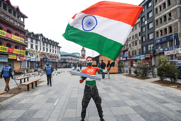 Tourist paints himself in Tricolour as he marks 77th Republic Day at Srinagar's Lal Chowk