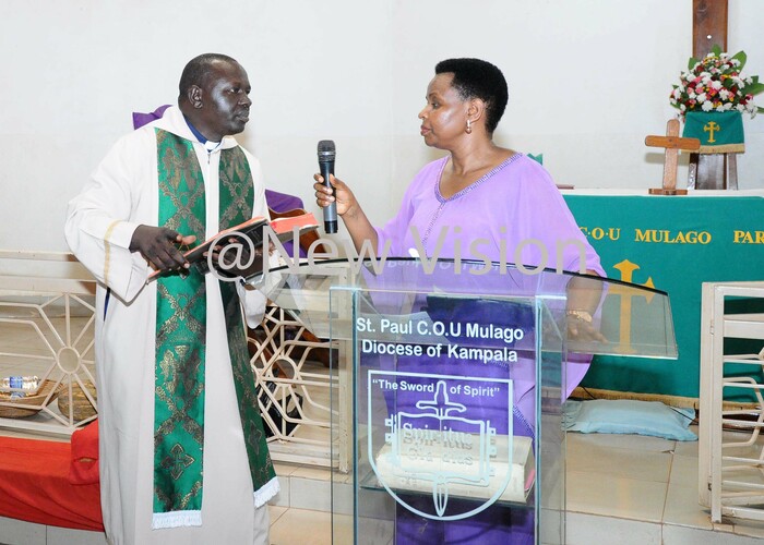 t ol dith akalema the ead of the ntiorruption nit in tate ouse with church priests ev  regory yamukama during thinks giving ceremony at t aul hurch of ganda ulago on ovember 17 2019