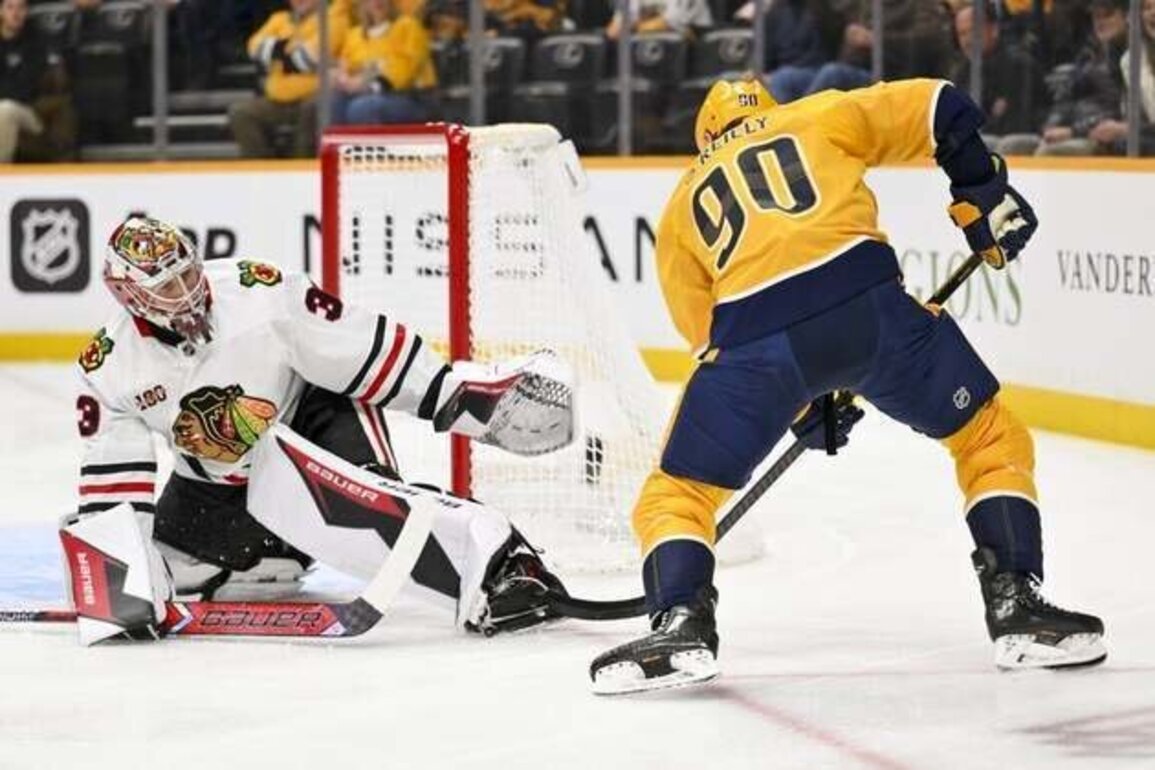 Blackhawks' Drew Commesso walls off Predators for shutout win