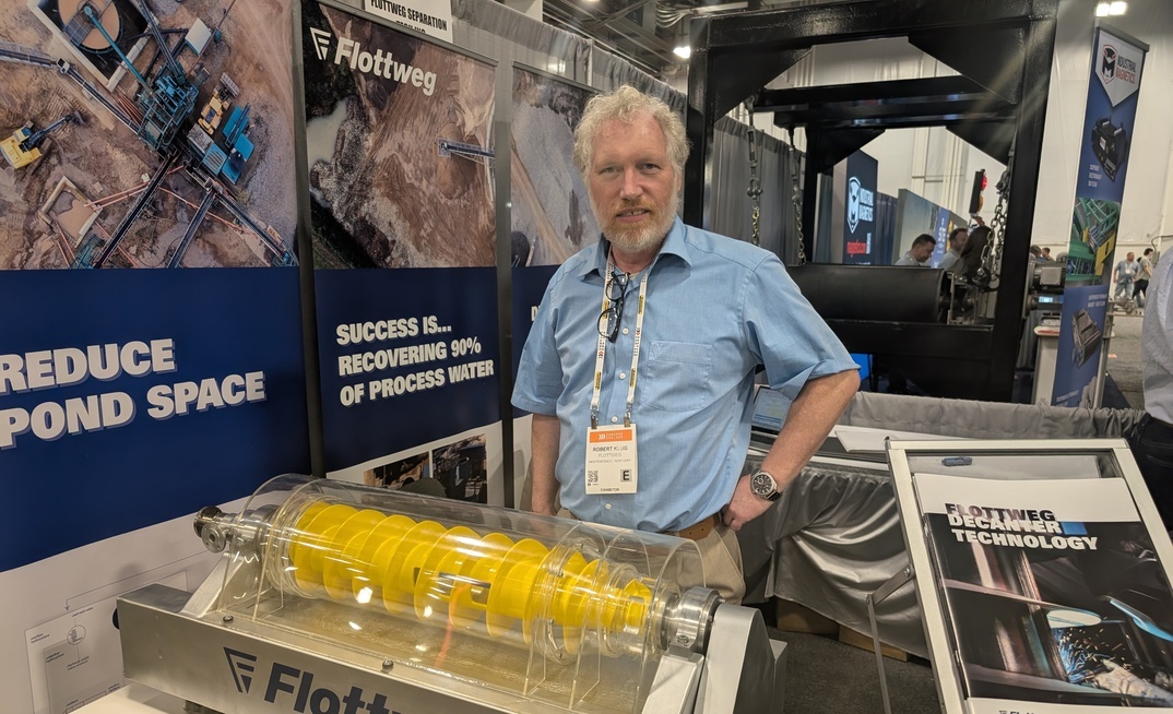 Robert Klug, Flottweg’s global sales engineer and application manager for mining, with a demonstration centrifuge