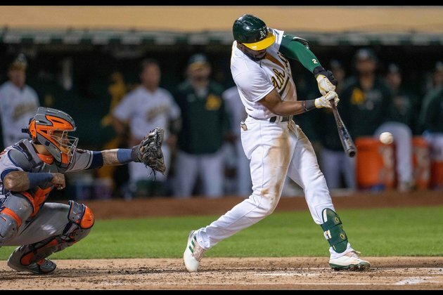 Slumping A's finally bust out in 14-2 blowout of Astros
