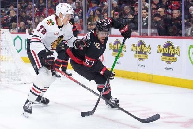 Senators score 3 3rd-period goals to extend Blackhawks' skid