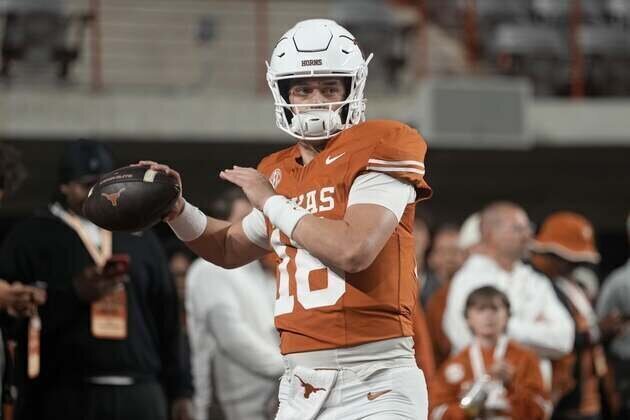 Report: Texas QB Arch Manning out of boot, will be limited this spring