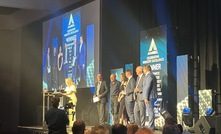 Peter Bewick accepts the Prospector Award alongside the Encounter Resources team