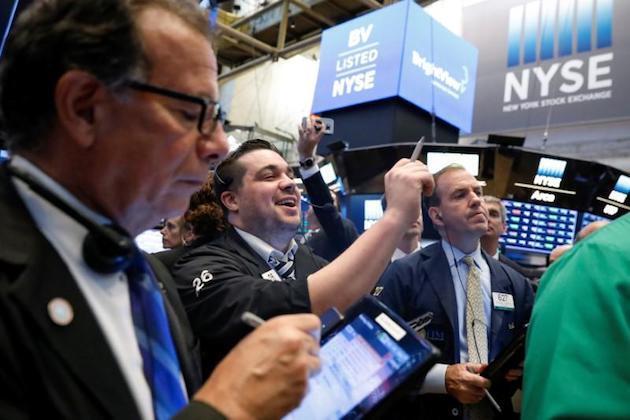 Wall Street rebounds after Fed-inspired sell-off, techs lead rally