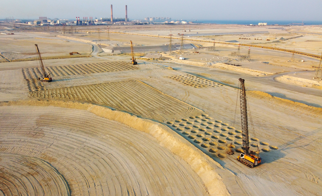 Soil compaction for the Sabah Al Ahmad Sea City construction project where a total of six Bauer MC duty-cycle cranes are being used in Kuwait under extreme conditions