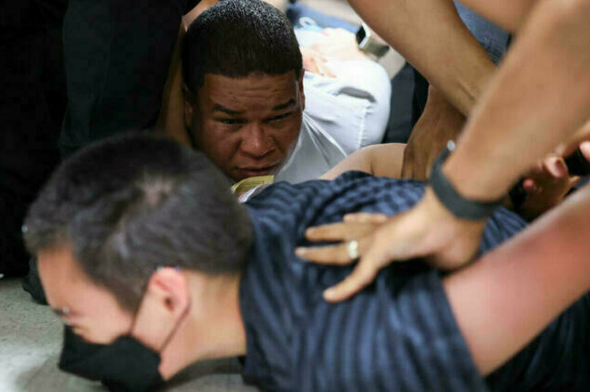 Masked agents launch sweeping immigration raids in LA and New York