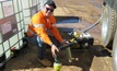 David Handle with a modified spray designed to attach to a firefighting pump.