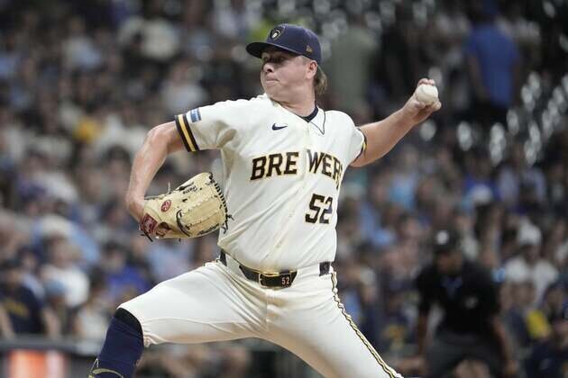 Brewers tie club mark with 22 runs while blanking Mariners