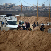 Israel issues warning as troops hold buffer zones in Gaza