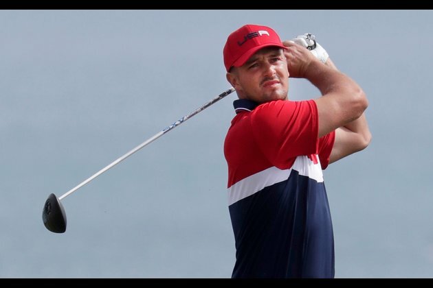 Bryson DeChambeau cards 64 to seize lead at Hero World Challenge