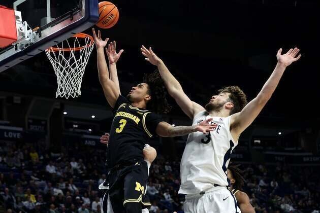 Top 25 roundup: No. 2 Michigan barely avoids upset vs. Penn St.