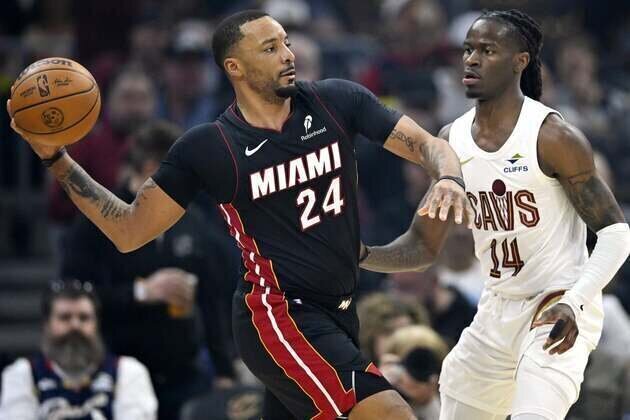 Heat waste 21-point lead, then surge past Cavaliers