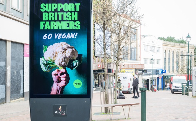 The billboard tells people to support farmers by going vegan (Ben Stoney Photography)