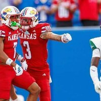 Jalon Daniels throws for 4 TDs as Kansas routs FCS foe Wagner