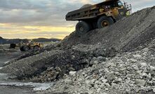  A dump truck was reversing to a tip head when it breached a windrow, with two wheels going through the windrow. 