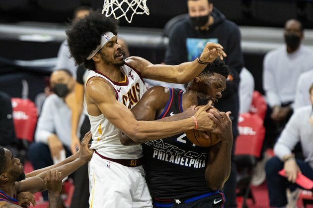 Cavs overcome Joel Embiid, Sixers to get OT win