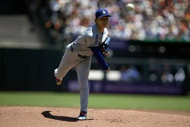 Dodgers' two-out rally puts away rival Giants in extras