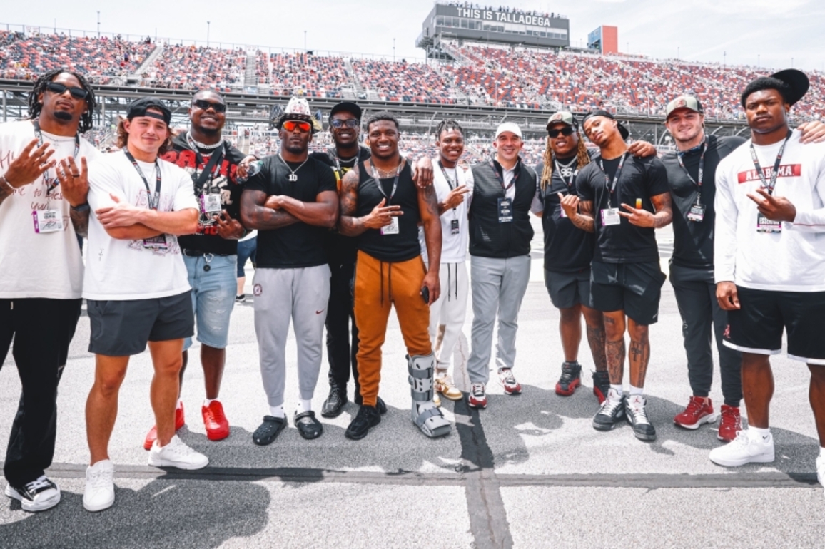 WATCH- Alabama football stars take on wild scenes at Talladega