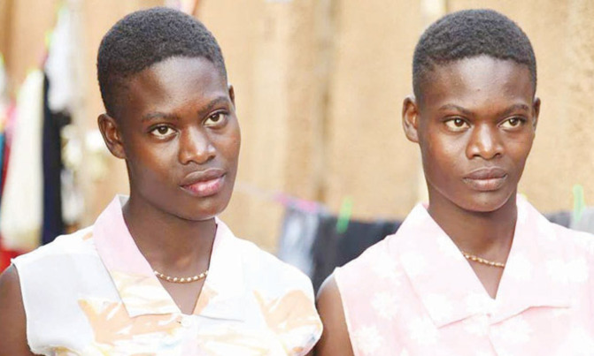 Emotions as twins switched at birth reunite Emotions as twins switched at birth reunite