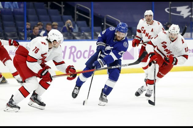 Hurricanes beat Lightning to maintain share of first place