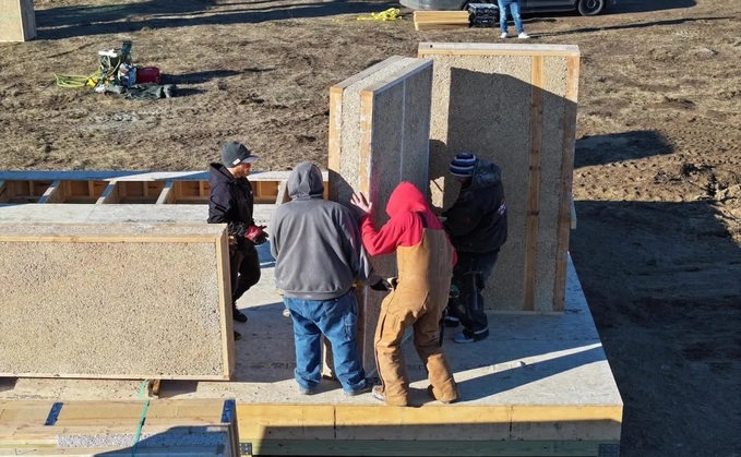 Members of the Lower Sioux Indian Community install Hempcrete, an alternative building material. Source: Lower Sioux Indian Community