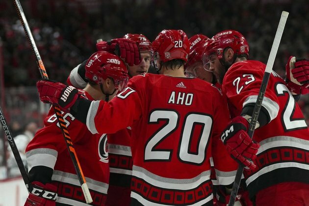 NHL roundup: Hurricanes storm back, edge Kings in OT