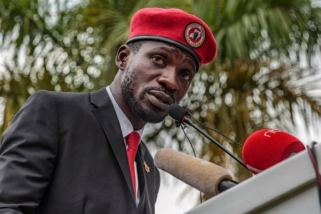 Ugandan pop star-turned-politician escapes arrest on motorbike