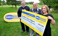 Builders' merchant stacks up cash for charity
