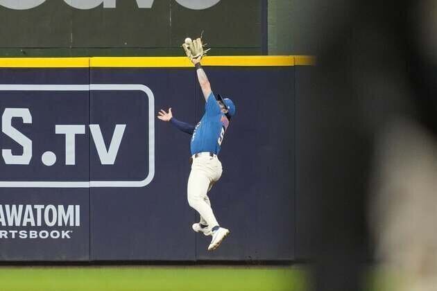Brewers bid to make another defensive stand vs. Marlins