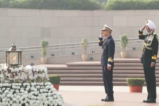 Rear Admiral Mohamed Tahin, Inspector of the Moroccan Royal Navy pays tribute at National War Memorial