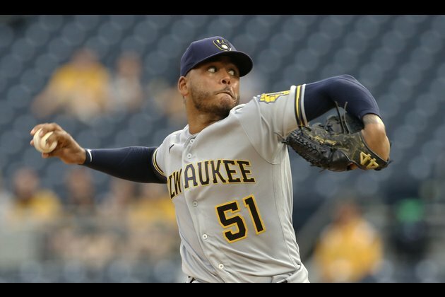 Manny Pina homers twice as Brewers cap sweep of Pirates