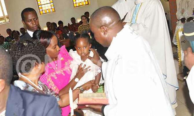 Prince Wasajja baptises daughter Prince Wasajja baptises daughter