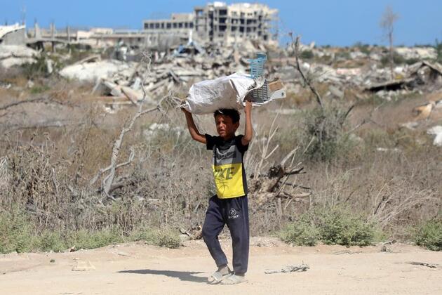 Fragile calm returns to Gaza as thousands of displaced residents head north