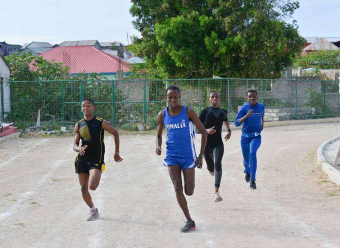 ohamed races with other athletes during training at anadir tadium