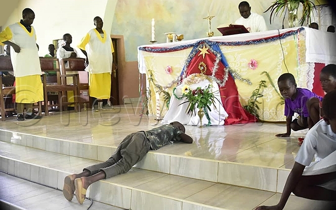  child takes a nap during hristmas prayers hoto by aria amala