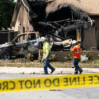 6 aboard jet that slammed into San Diego neighborhood presumed dead