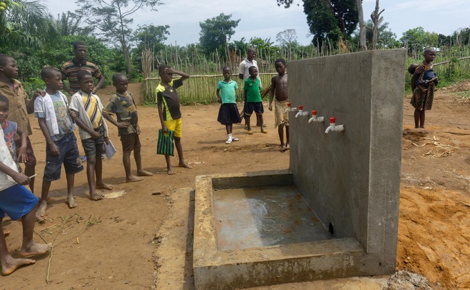 Children in the DRC with a new clean water facility | Credit: Wildlife Works Carbon 