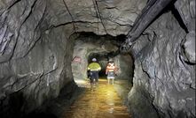 On-site workers in Amalgamated adit (640 Level), the main access for the Reward gold mine. Image supplied by Vertex Minerals.