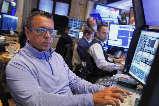Wall Street gains, shaking off tariff concerns