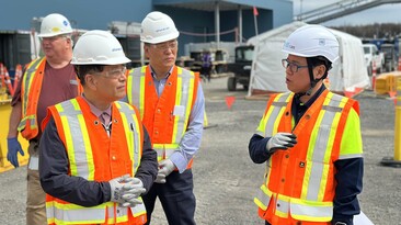 POSCO Group chairperson In-hwa Chang (left) inspects the Ultium CAM JV site in Canada