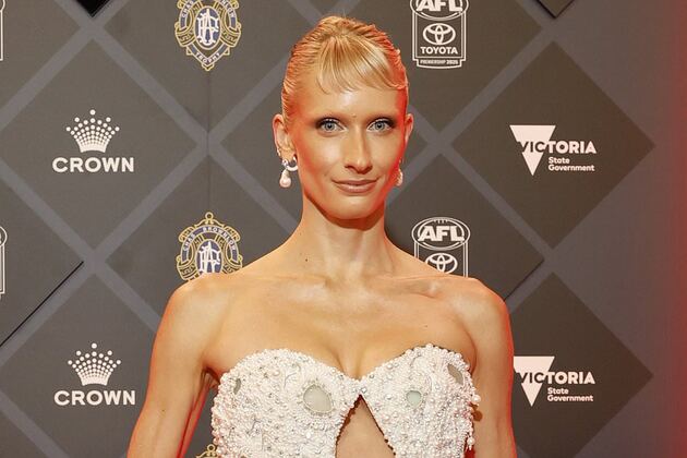 'Ultra-woke' AFL WAG Dee Salmin shocks fans with her passport photos