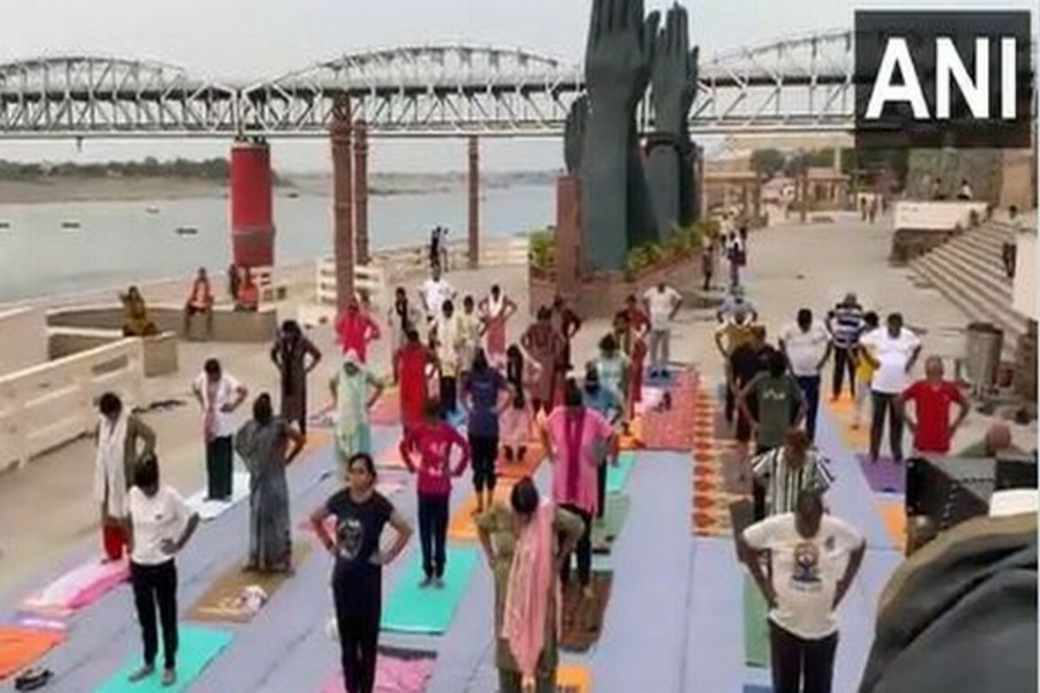 Uttar Pradesh: People perform Yoga at Namo Ghat ahead of International Yoga Day