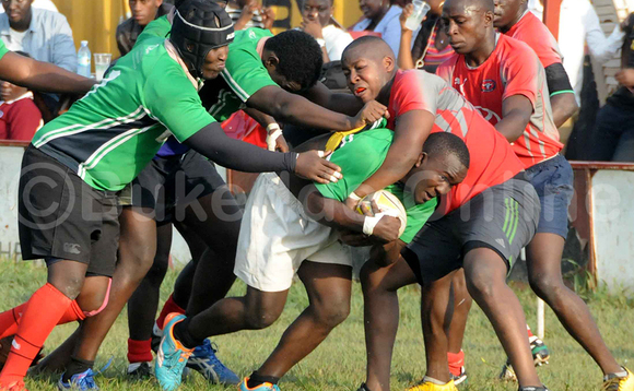 Omuzannyi wa Makere Impis Pius Mpoza ng'agezaako okuwaguze mu kisenge kya Toyota Buffaloes mu liigi ya Rugby e Lugogo Jan 27 2018. Buffaloes yawangudde ku bugoba 64-05. (ekif:Silvano Kibuuka) Omuzannyi wa Makere Impis Pius Mpoza ng'agezaako okuwaguze mu kisenge kya Toyota Buffaloes mu liigi ya Rugby e Lugogo Jan 27 2018. Buffaloes yawangudde ku bugoba 64-05. (ekif:Silvano Kibuuka)