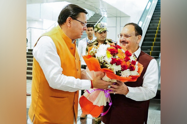 Uttarakhand CM Pushkar Dhami welcomes Union Minister JP Nadda at Dehradun's Jolly Grant airport